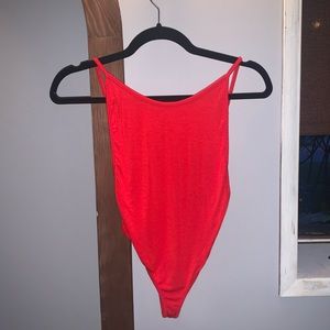 Red low back body suit